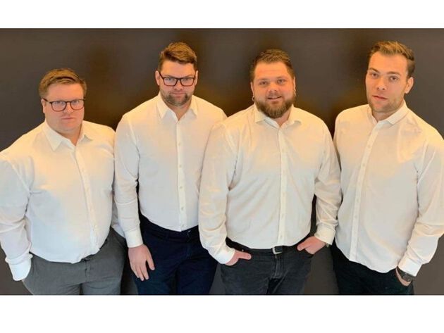 De fire prosjektdeltakerne står på rekke.