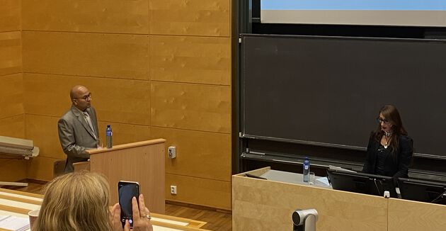 Ammar Bahadur Singh defends his thesis in an auditorium
