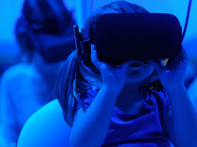 Illustration photo: a girl wearing head mounted display