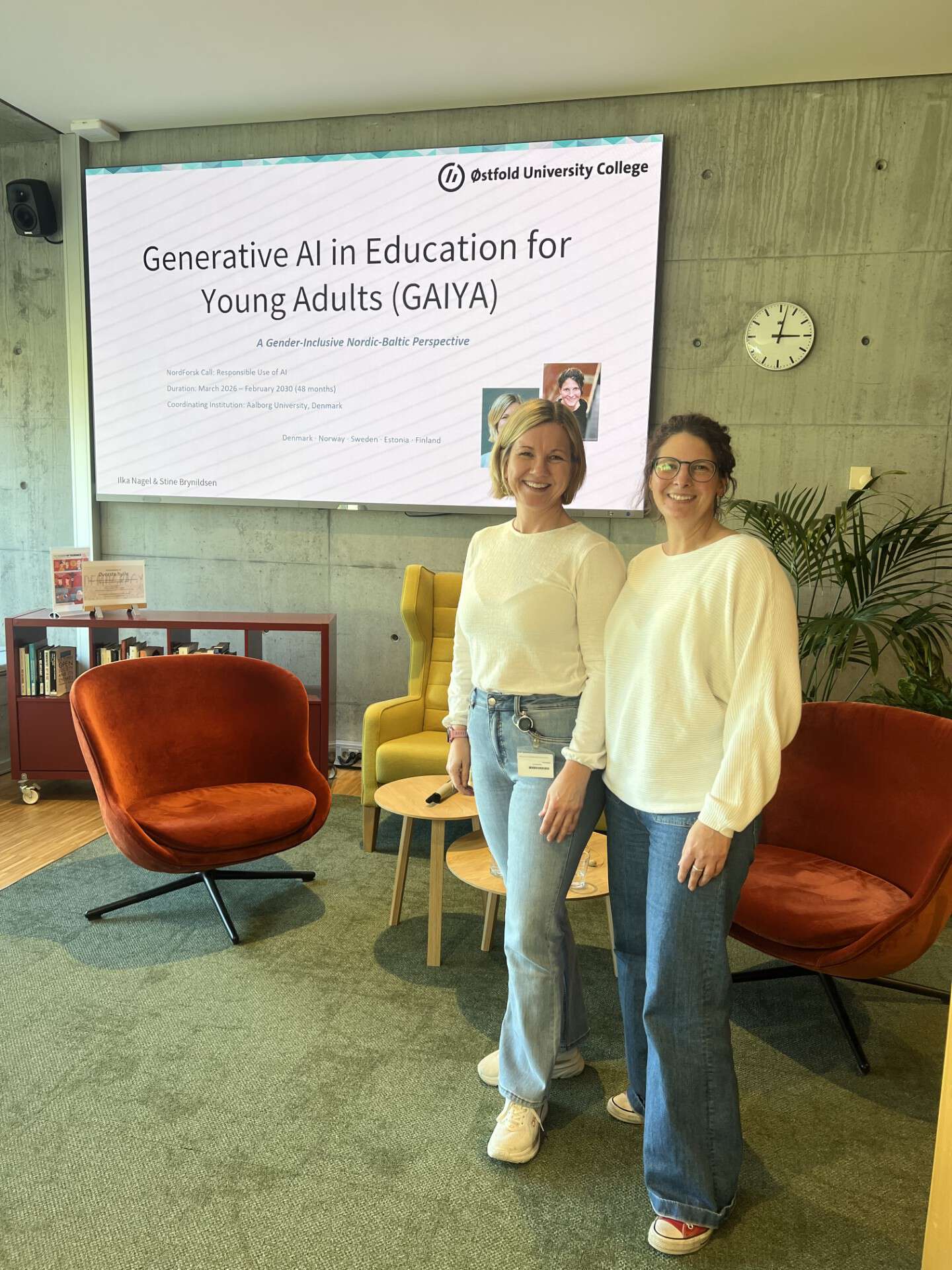 Stine and Ilka in front of their presentation
