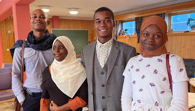 Photo of three Zanzibari students